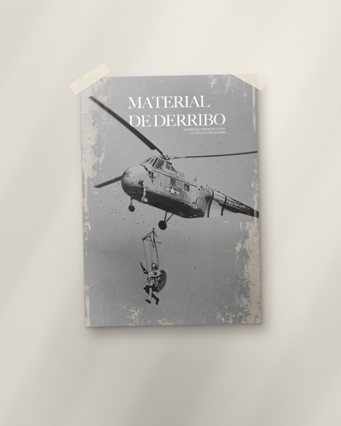 Portada del dossier Material de derribo pegada en una pared